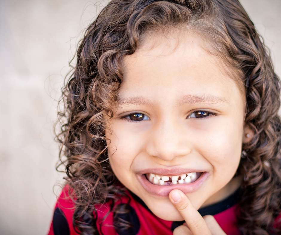 Dentist consulting with a patient at Shadow Creek Children's Dentistry