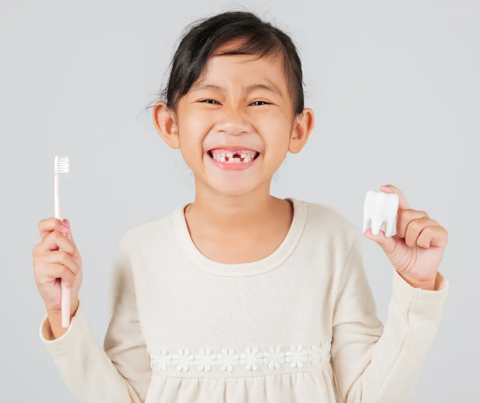 Friendly bilingual dental team member welcoming a family at Shadow Creek Smiles