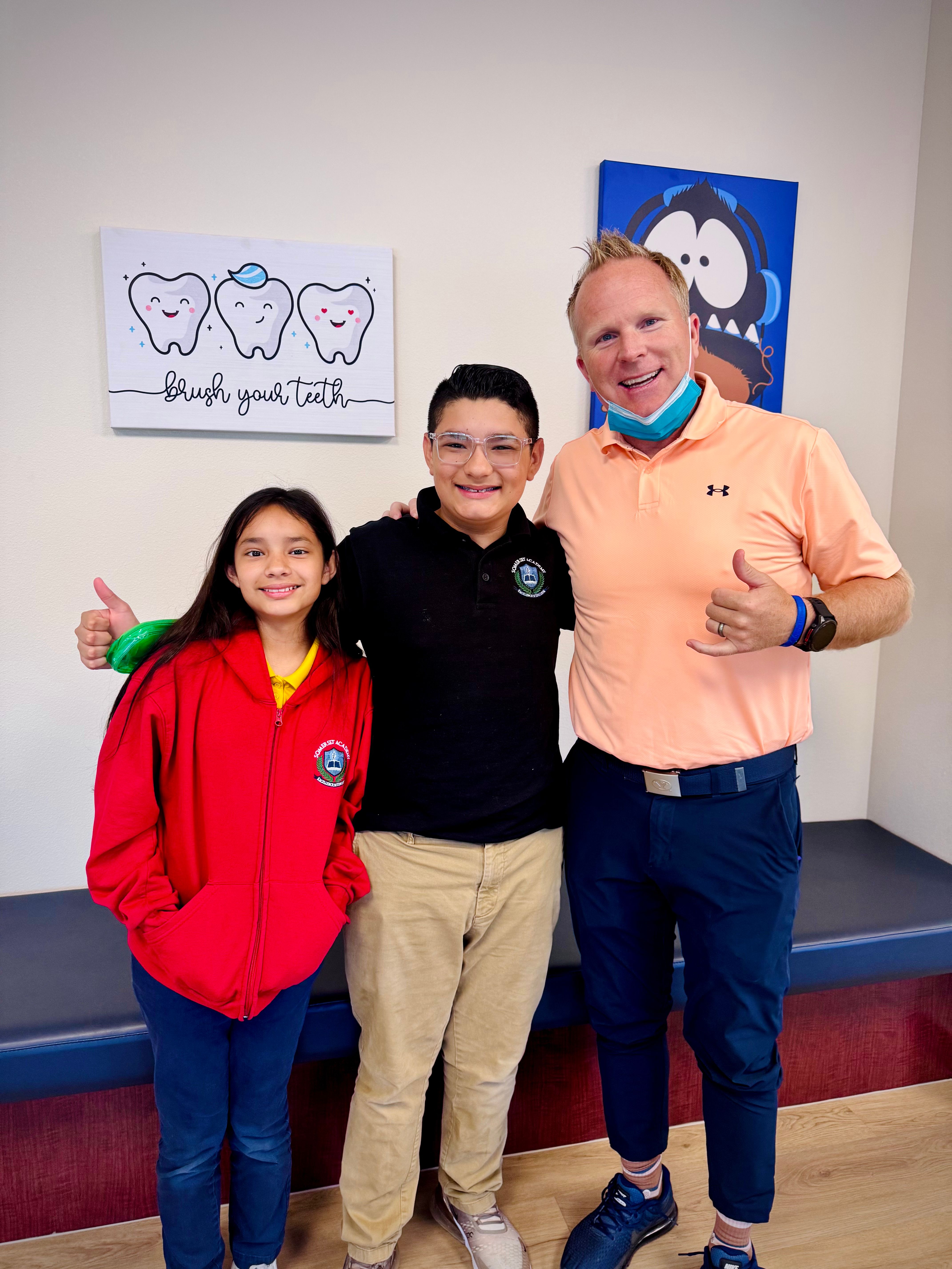 Dr. Ryan Jolley with a young patient at Shadow Creek Children's Dentistry and Orthodontics