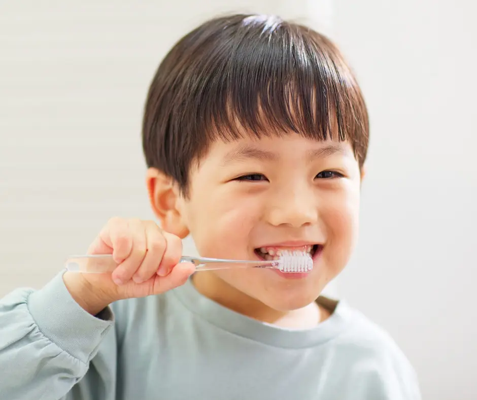 Pediatric dental specialist gently caring for a young patient at Shadow Creek
